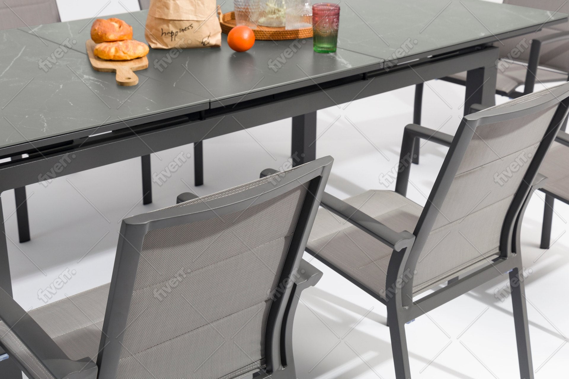 Tischgruppe Marcello mit ausziehbarem Gartentisch & 6 Armstühlen Dolly aus Aluminium & Textilen.